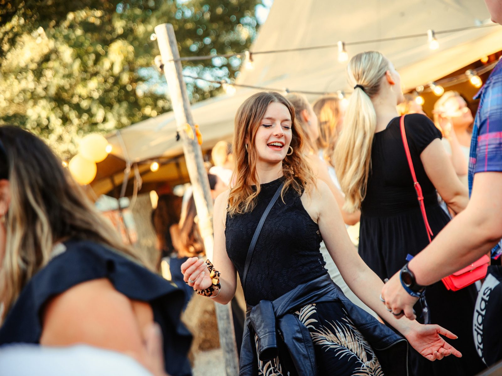 Festival crowd dancing outdoors